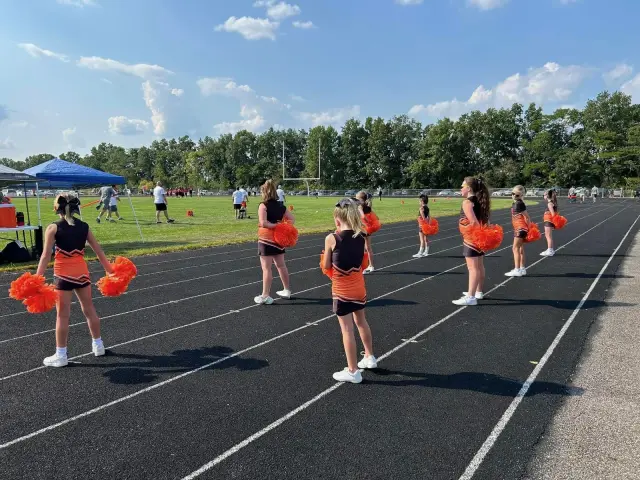 Jr Pacers cheer squad on the sideline