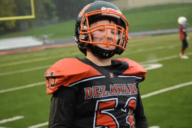 Jr Pacers player in his helmet, ready to play