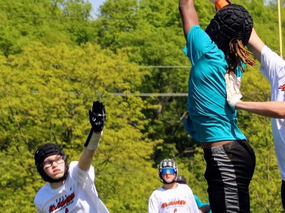 Jr Pacers 7v7 players contest a pass on defense