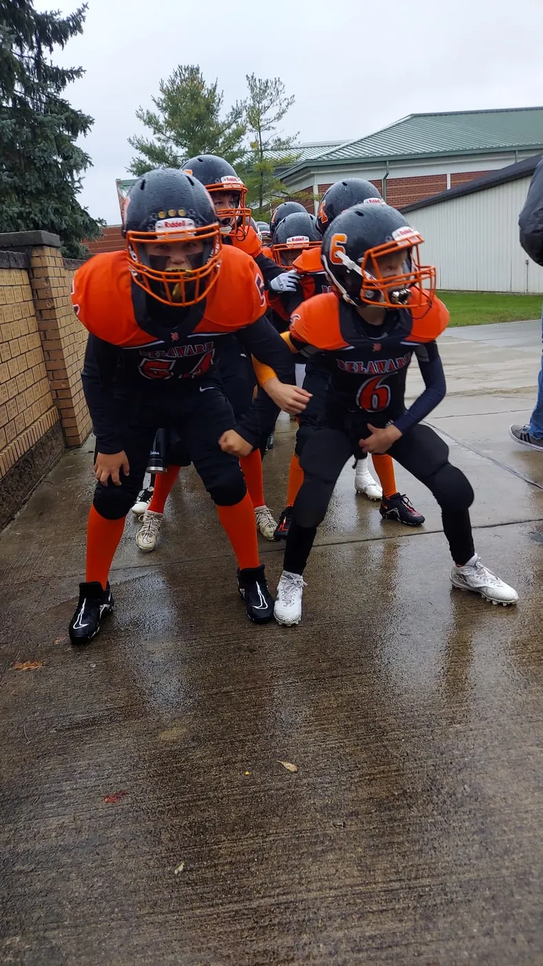 Two Jr Pacers players celebrating a win