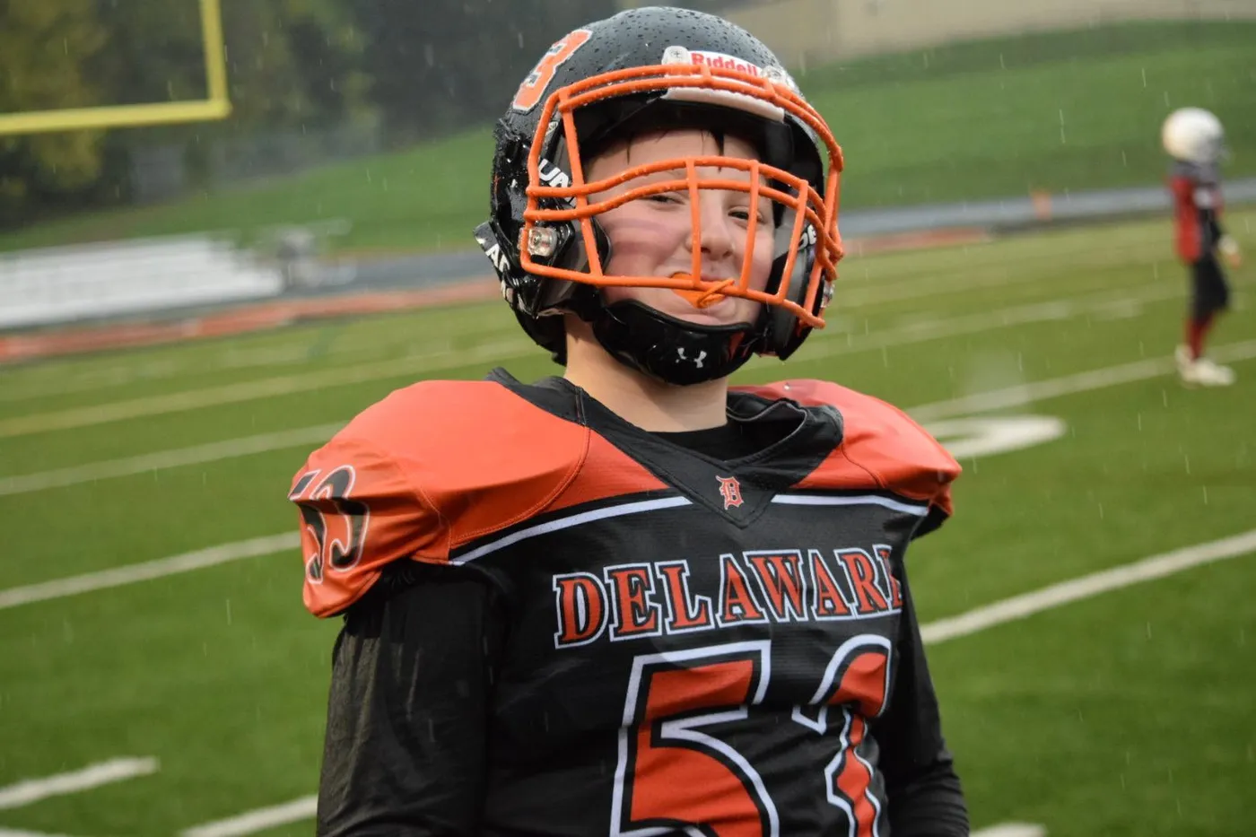 Jr Pacers player in his helmet, ready to play