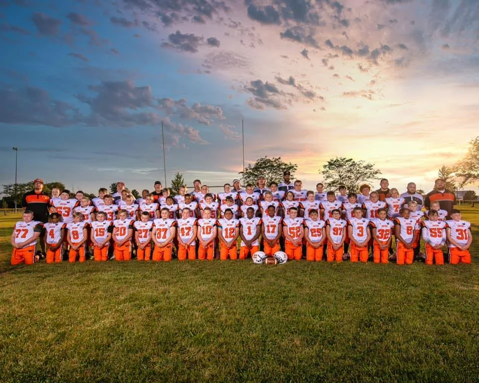 Jr Pacers athletes and families together at the field